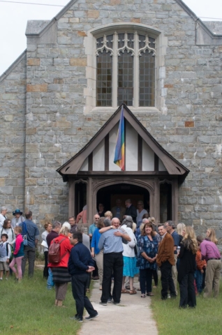 Gathering at the front entrance to the Sanctuary