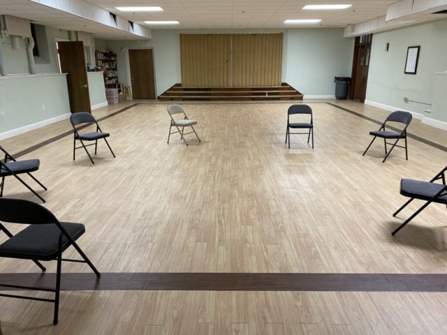 Spacious Community Hall with a stage at one end
